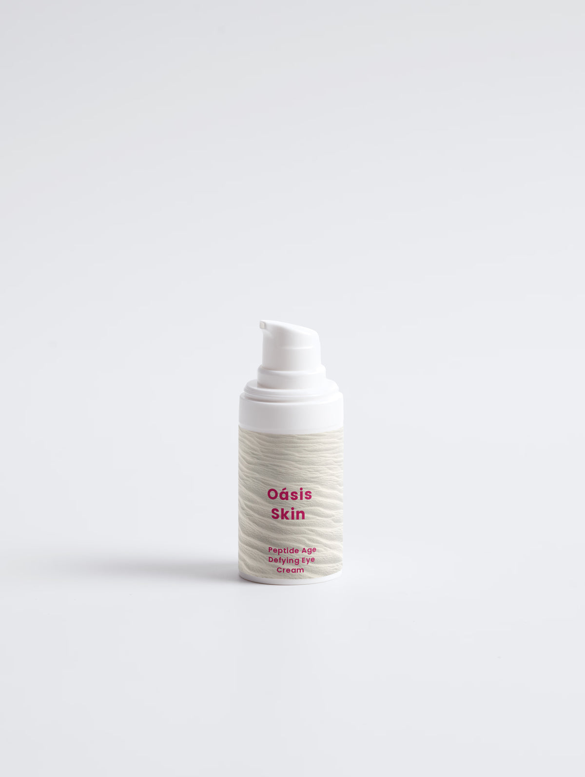 Peptide Age-Defying Eye Cream in a sleek white container with a pump, featuring textured design and pink branding.